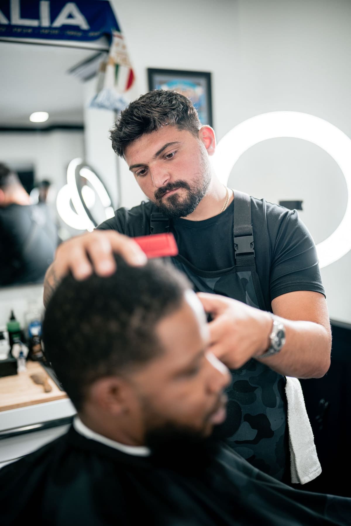 Detailed clipper work on a fade