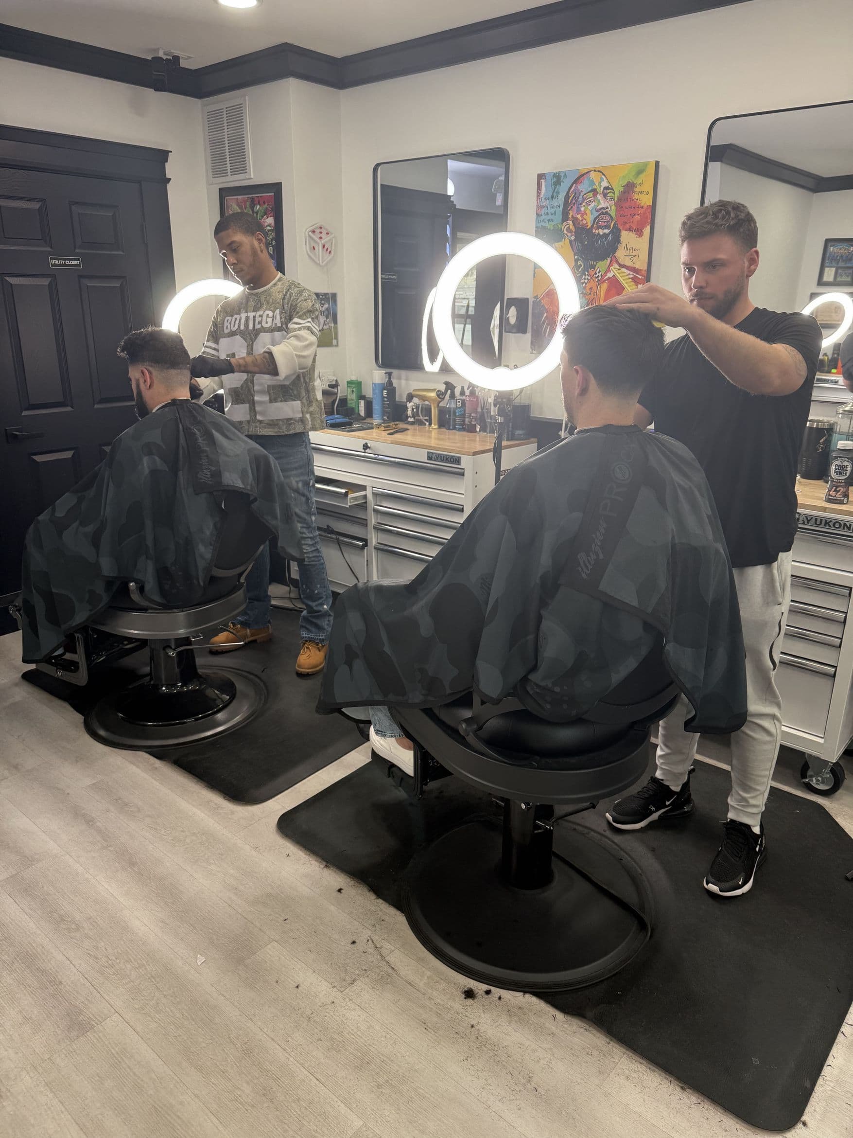 Colella Cutz Barber Studios on a busy evening on Kings Hwy N in Cherry Hill, NJ