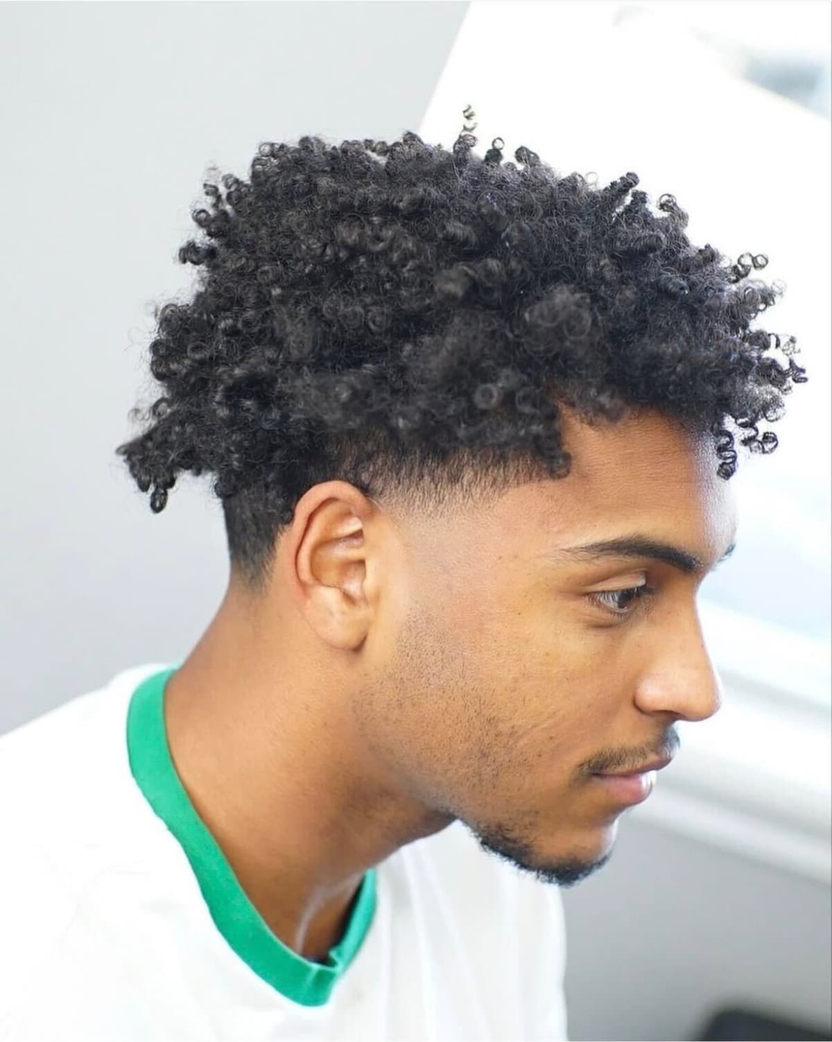 Curly top with temple fade
